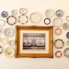 photo frame near assorted-color ceramic dishes