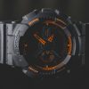round black and orange Casio G-Shock analog watch